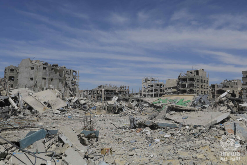 Image of flattened and severely damaged buildings